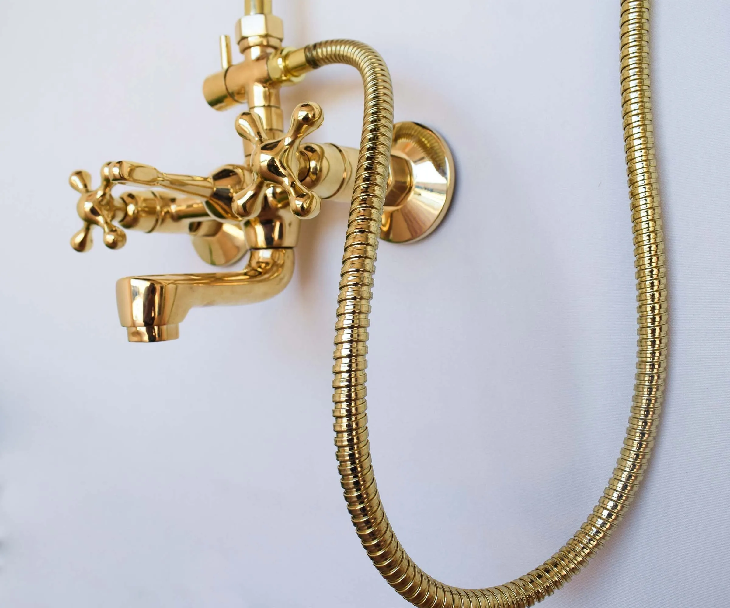 Unlacquered brass exposed shower system